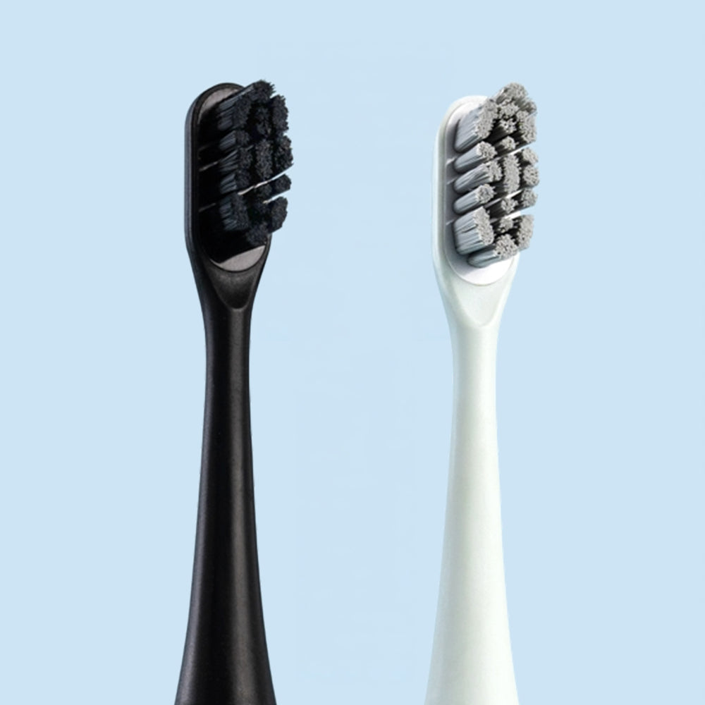 SmilePro soniske børstehoveder i Satin Black og Soft Mint